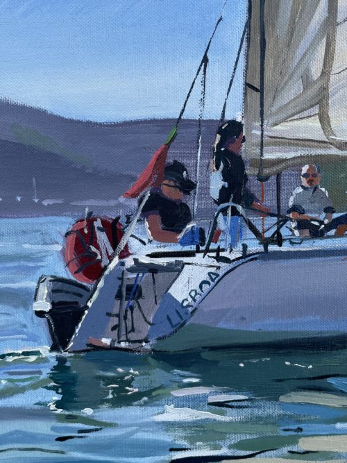 Close-up of the boat in 'Masty III', highlighting the textures and vibrant colours of the sail and hull