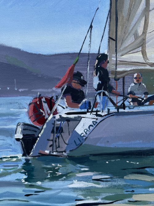 Close-up of the boat in 'Masty III', highlighting the textures and vibrant colours of the sail and hull