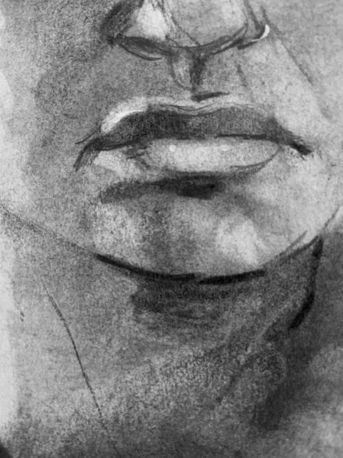 Close-up of the charcoal portrait of Tatiana, capturing the fine details of her facial features and realistic shading